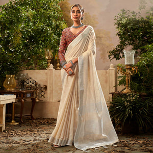 Cream Woven Pure Cotton Saree With Tassels
