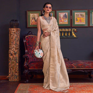 Cream Woven Art Silk Saree With Tassels