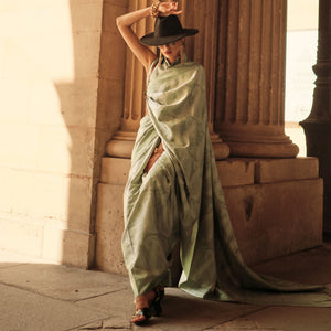 green-woven-satin-saree-with-tassels-1