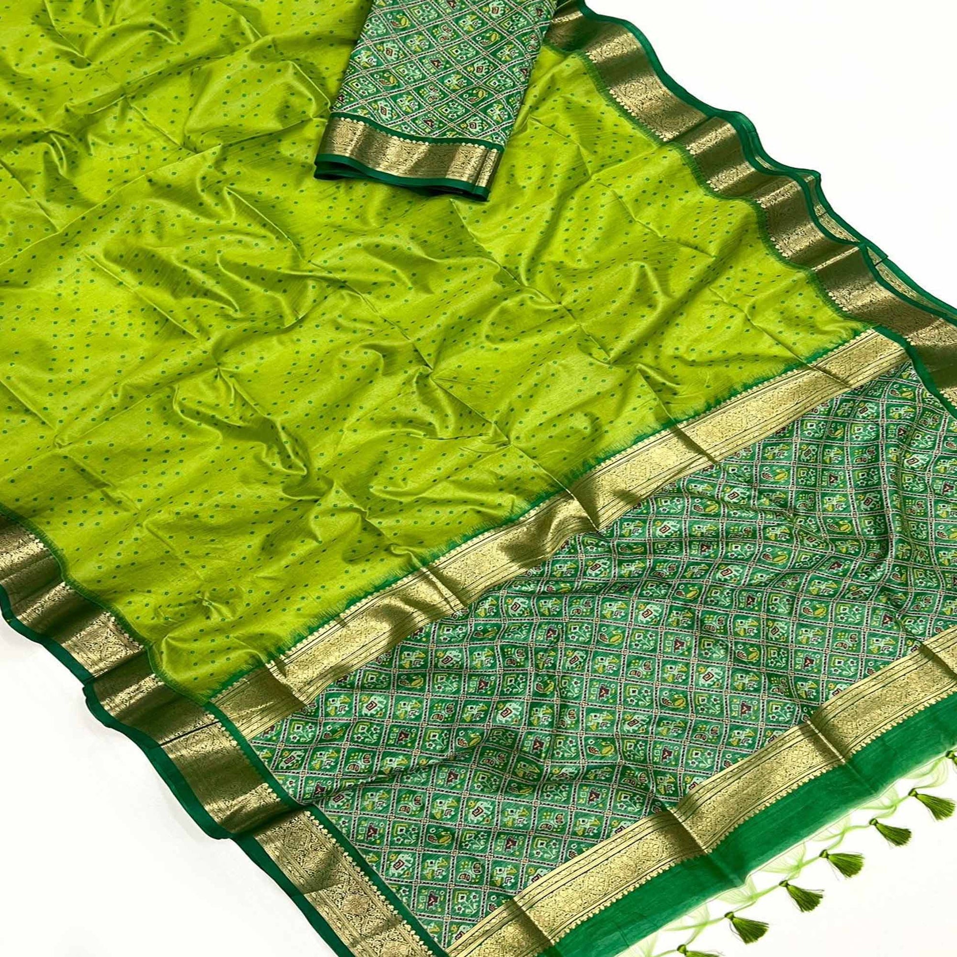 green-weaved-patola-tussar-silk-saree-with-tassels