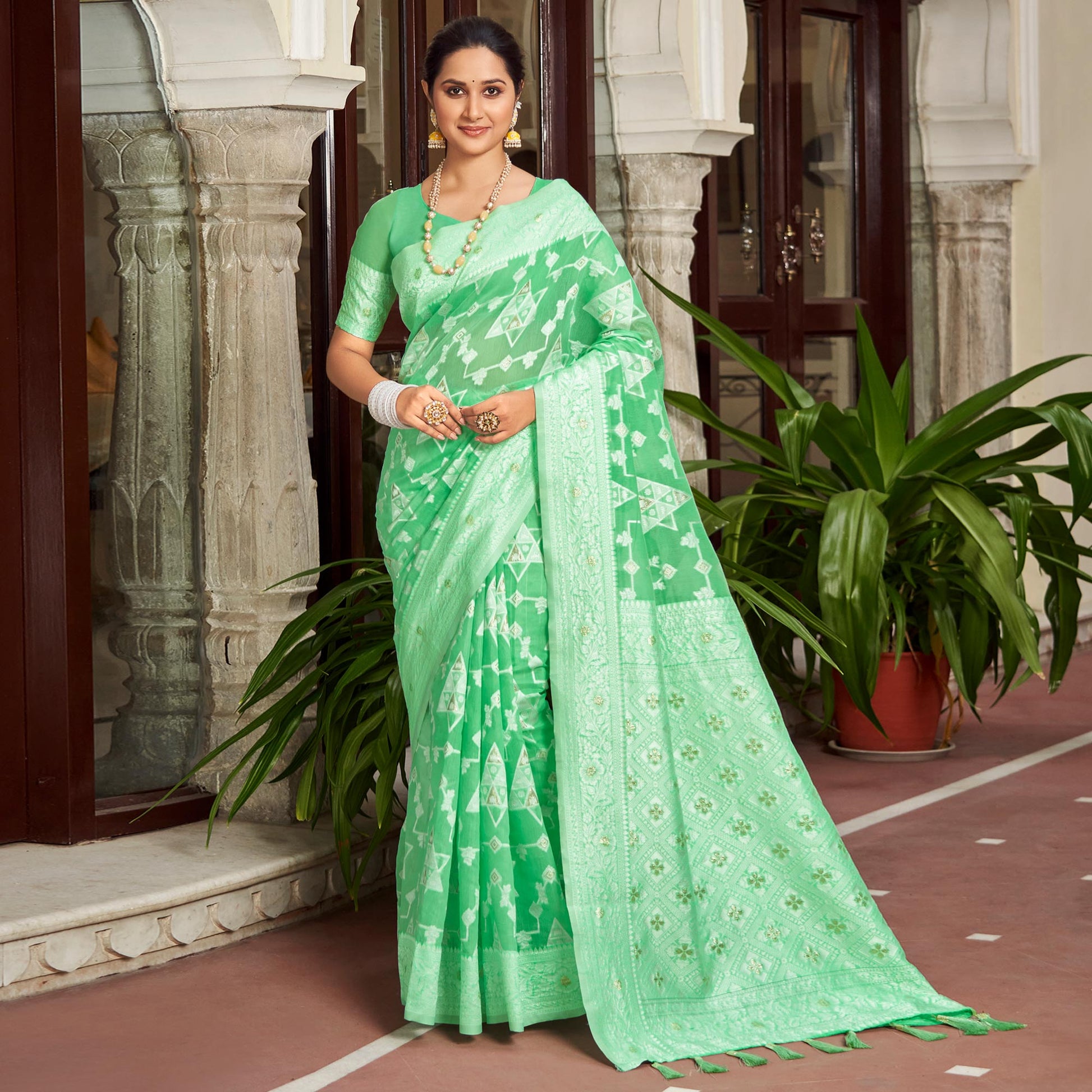 green-woven-cotton-silk-saree-with-tassels-13