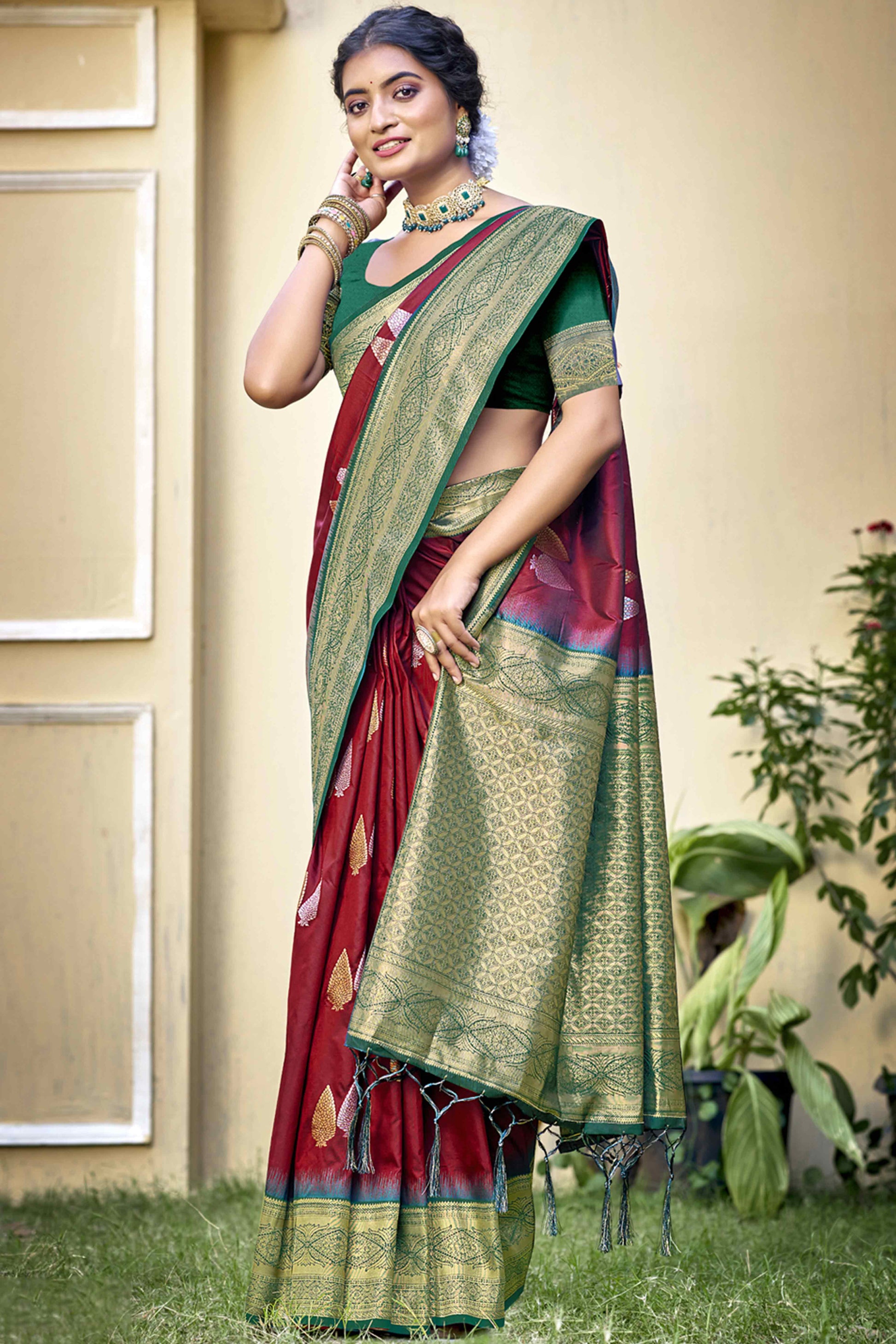 Maroon Woven Banarasi Silk Saree With Tassels