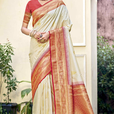 Cream Woven Banarasi Silk Saree With Tassels