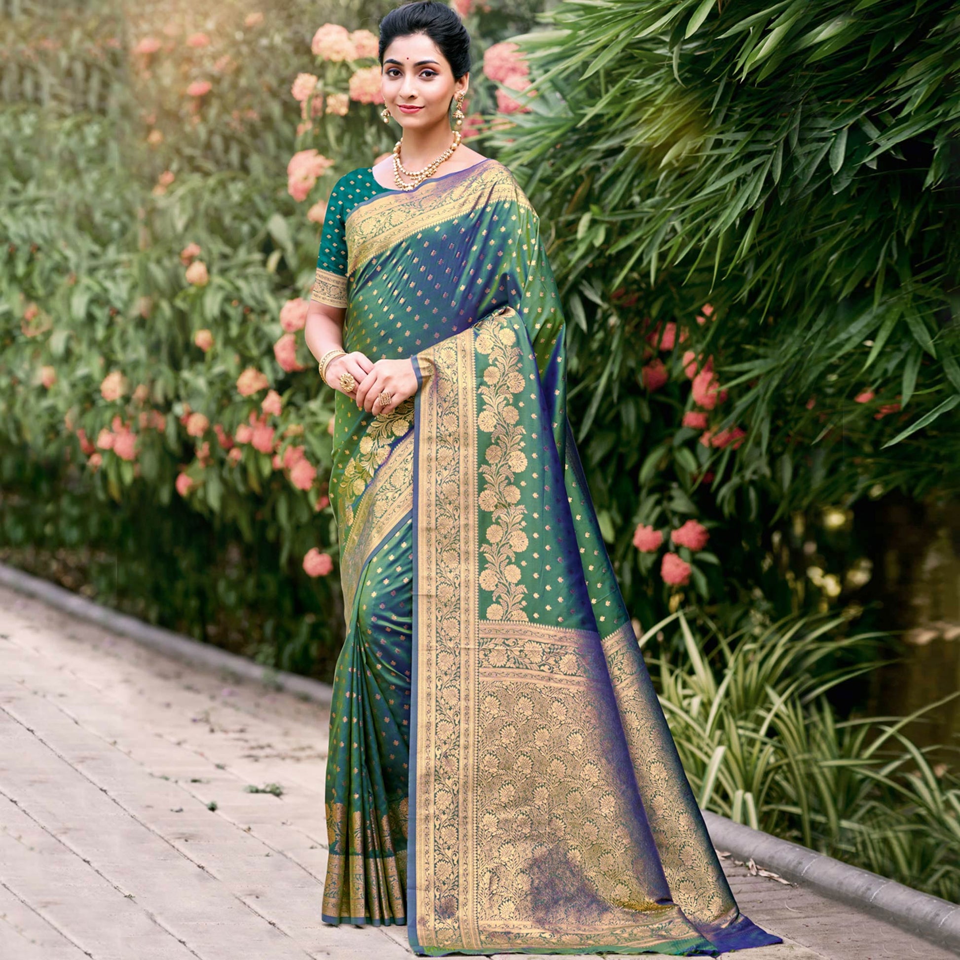 green-floral-woven-banarasi-silk-saree-with-tassels-11