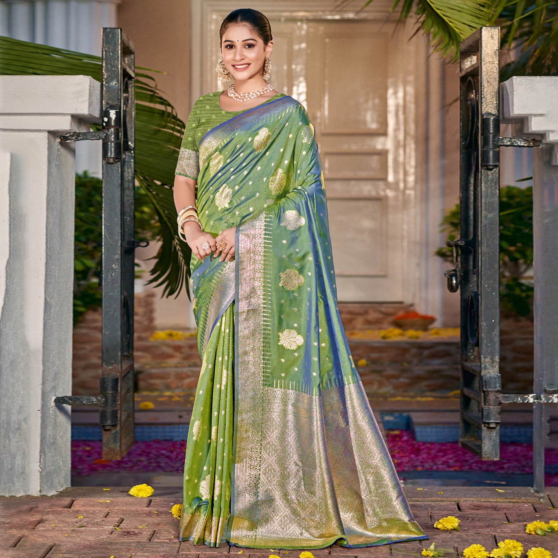 green-floral-woven-banarasi-silk-saree-with-tassels-12