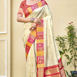Cream Woven Banarasi Silk Saree With Tassels