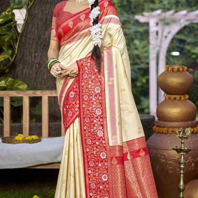 Cream Floral Woven Banarasi Silk Saree With Tassels