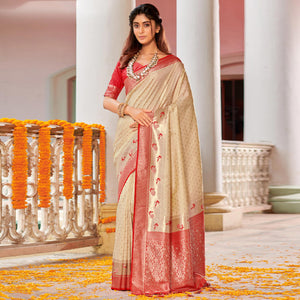 Cream Woven Banarasi Silk Saree With Tassels