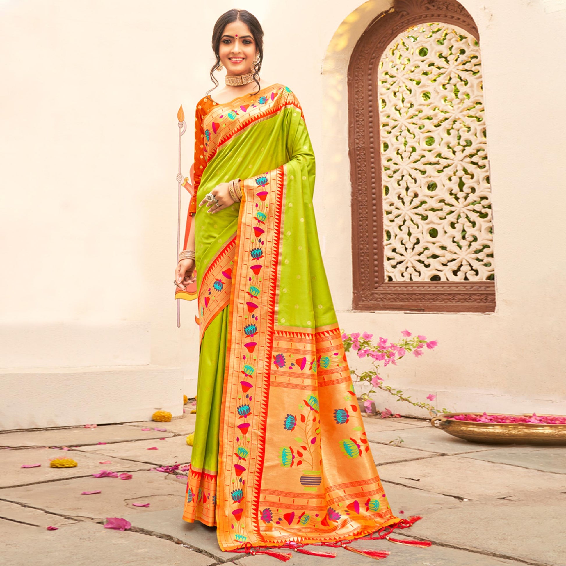 green-floral-woven-banarasi-silk-saree-with-tassels