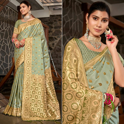 Light Green Woven Satin Silk Saree With Tassels