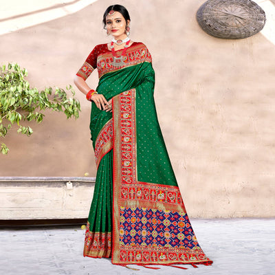 green-woven-patola-banarasi-silk-saree-with-tassels