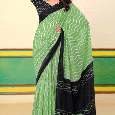 green-ikkat-printed-mulmul-cotton-saree