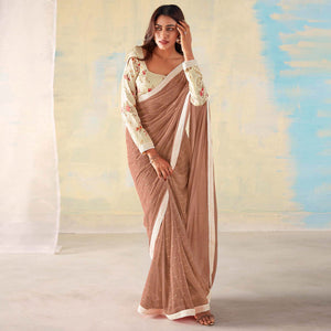 Brown Foil Printed Georgette Saree With Embroidered Border