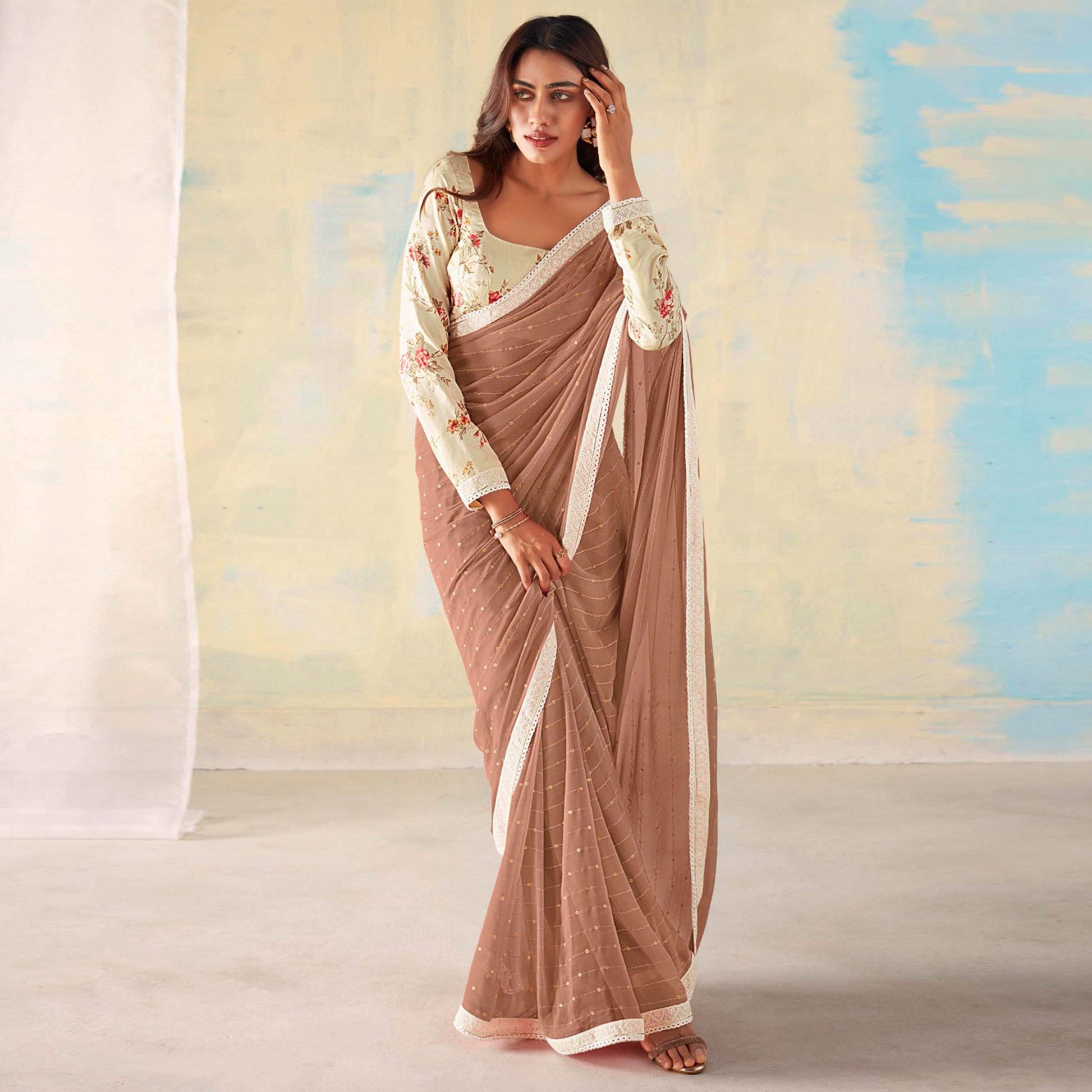 Brown Foil Printed Georgette Saree With Embroidered Border
