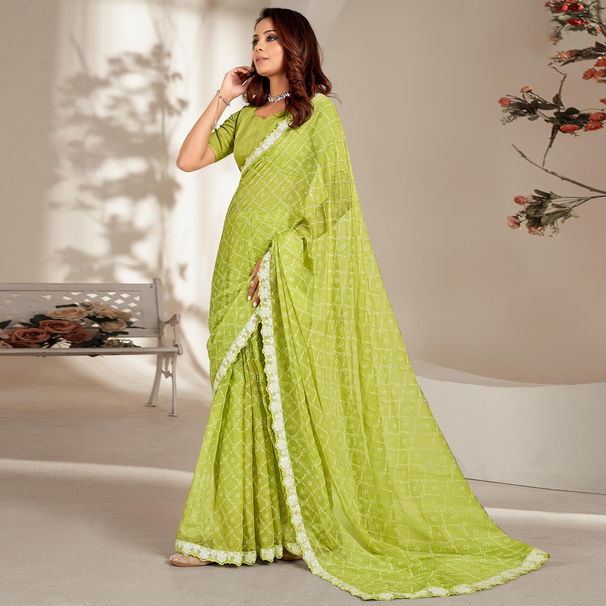 green-floral-printed-chiffon-saree-with-embroidered-border
