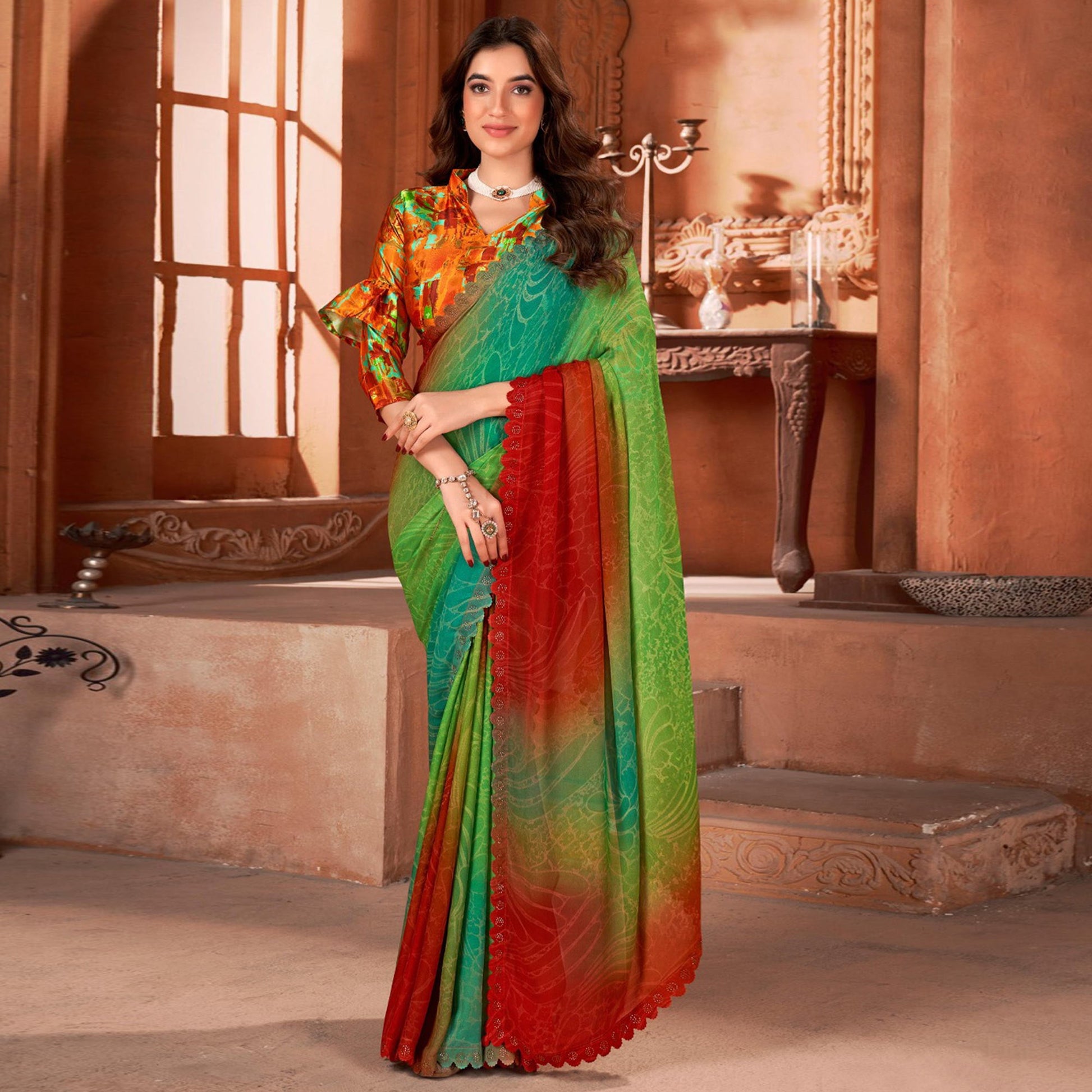 green-printed-moss-georgette-saree-with-swarovski-work-border