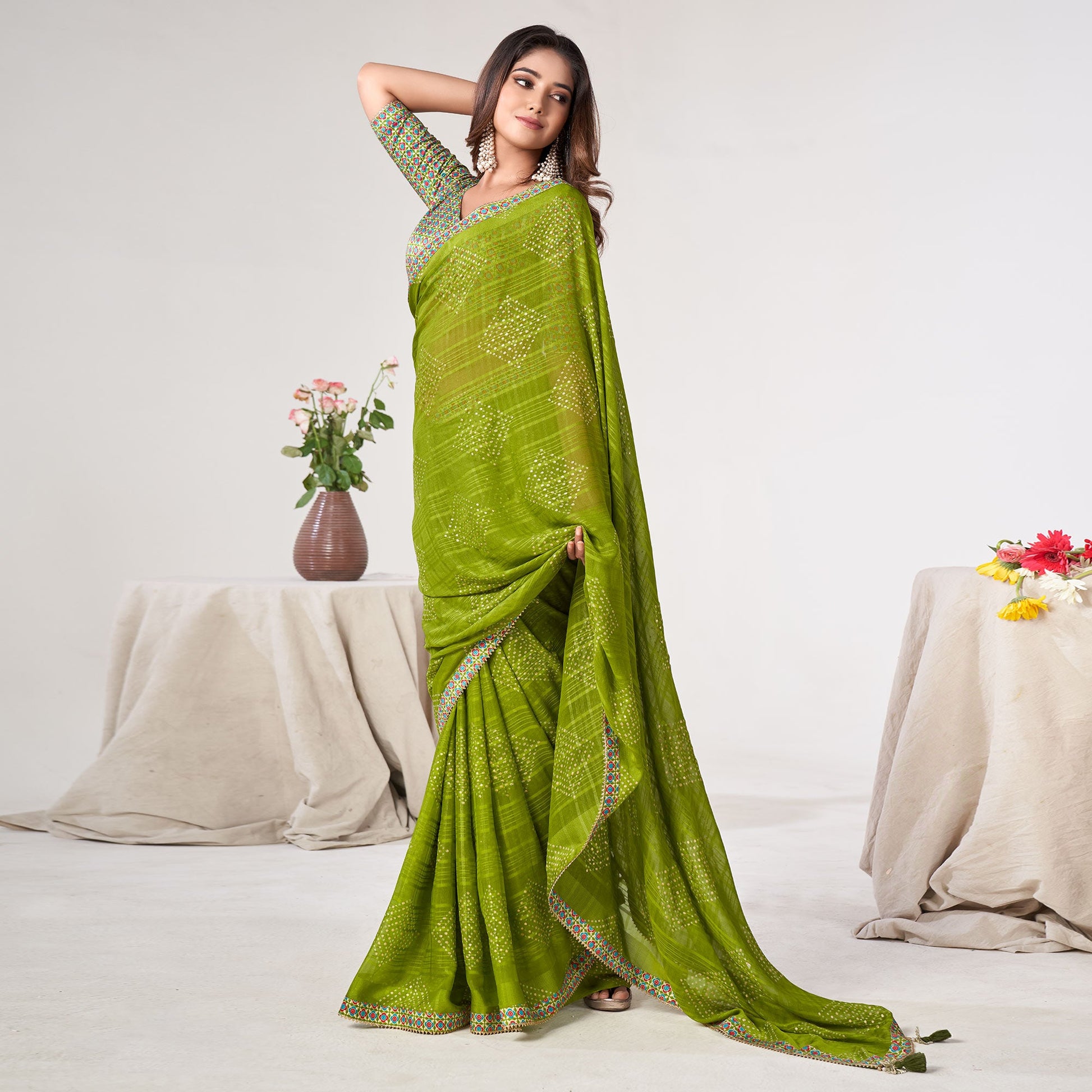 green-printed-georgette-saree-with-lace-work