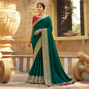 Morpich Green Solid With Embroidered Border Vichitra Silk Saree