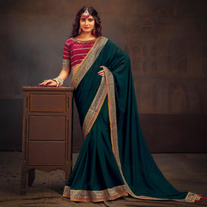 Morpich Green Solid With Embroidered Border Vichitra Silk Saree