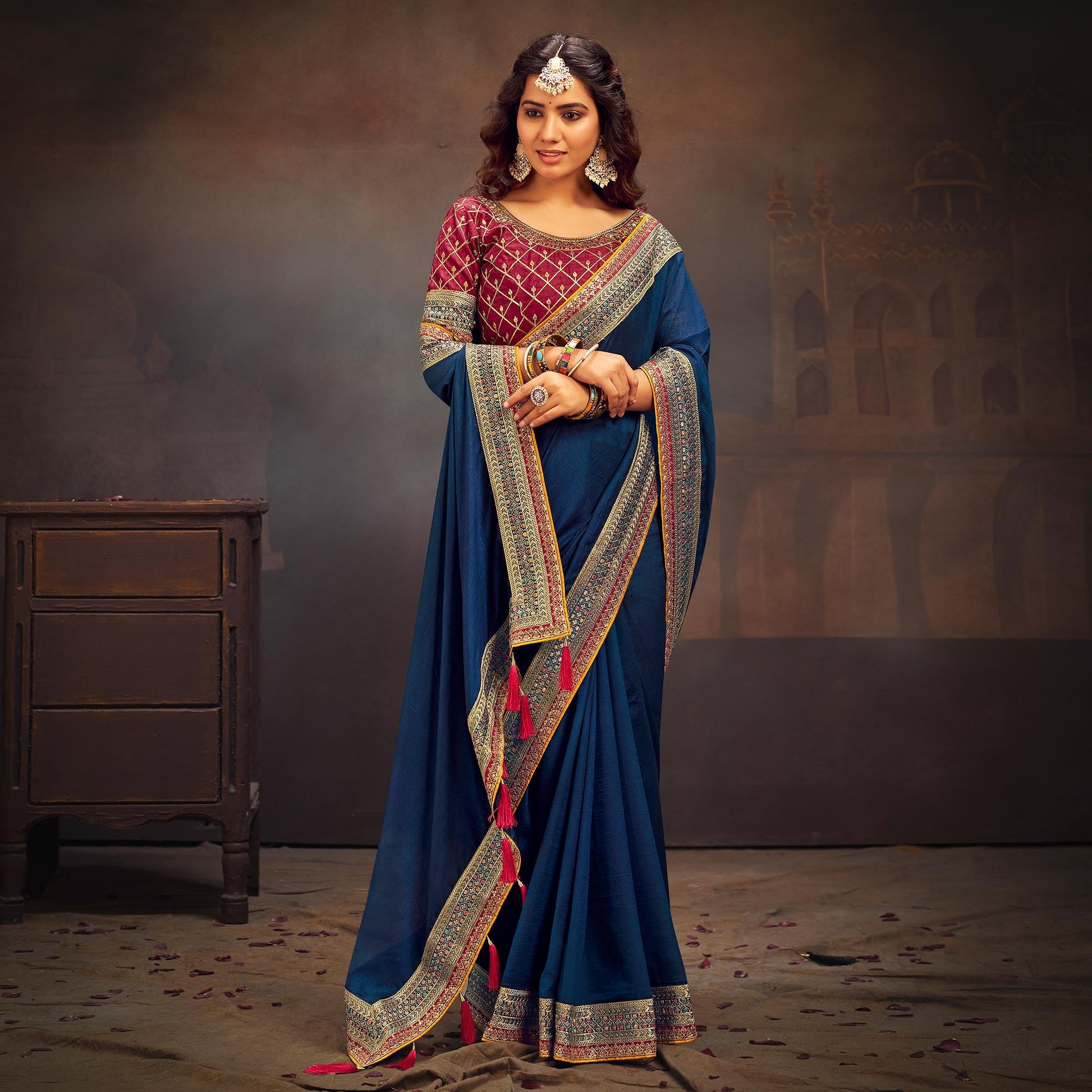 Blue Solid With Embroidered Border Vichitra Silk Saree