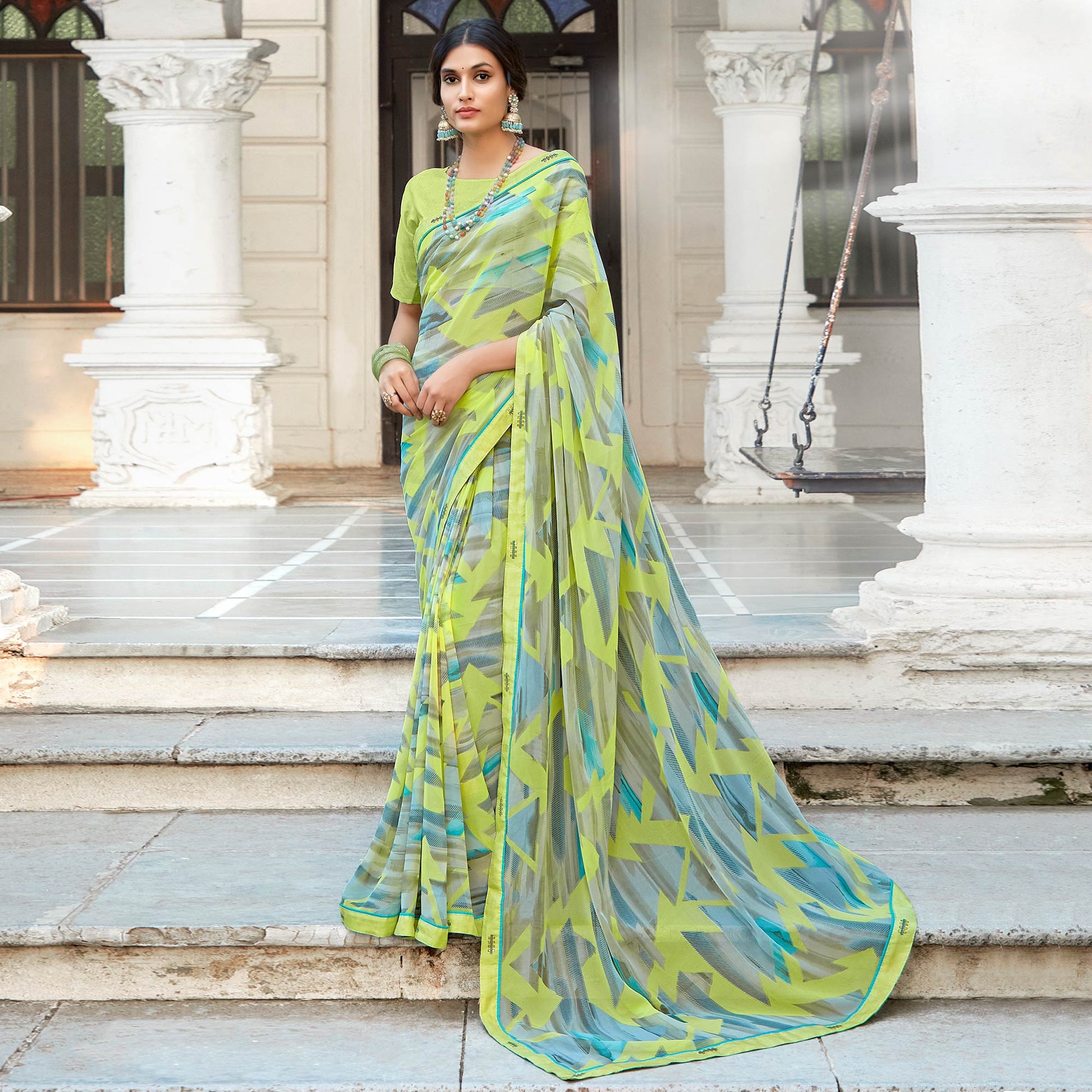 green-geometric-printed-georgette-saree-with-lace-border