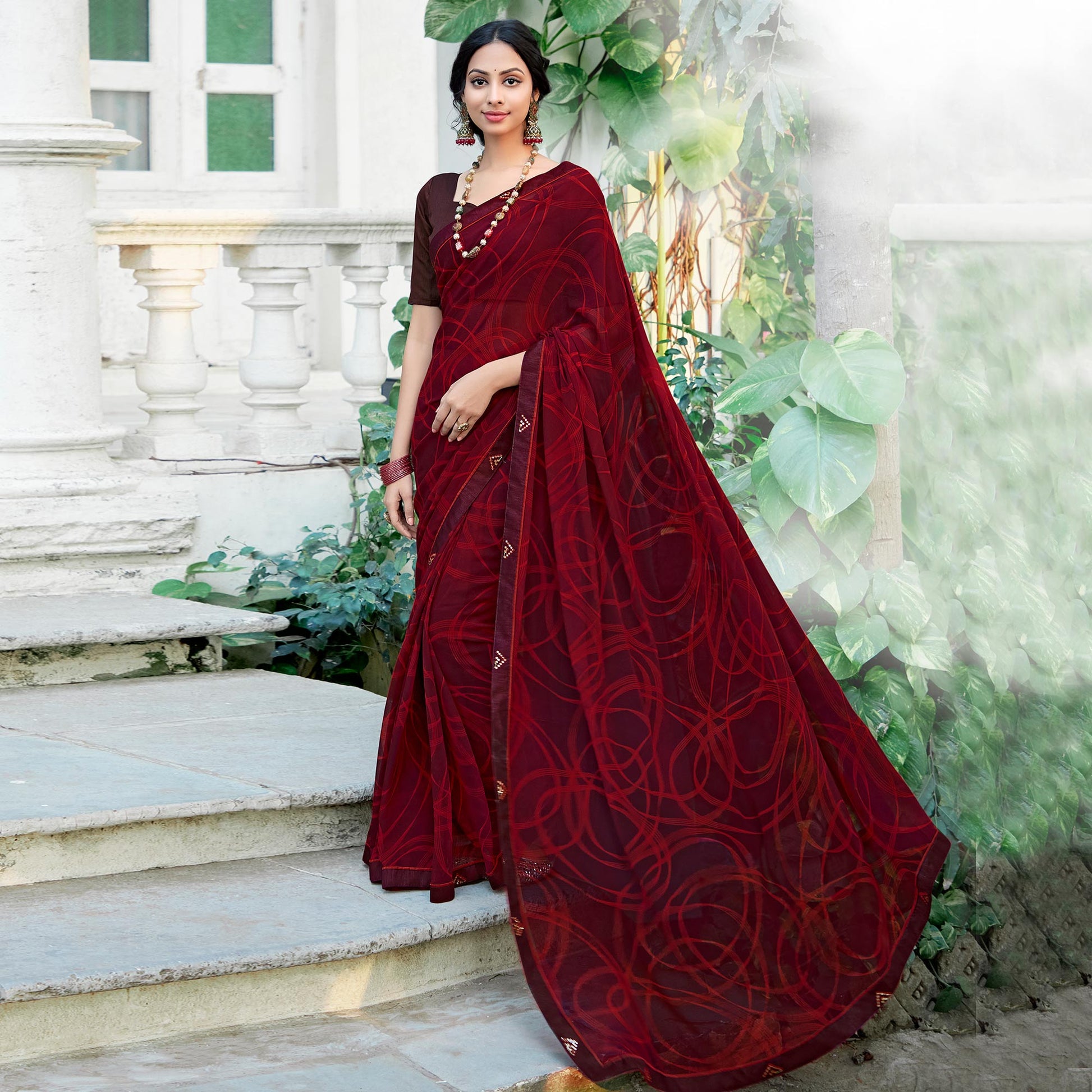 Maroon Geometric Printed Georgette Saree With Lace Border
