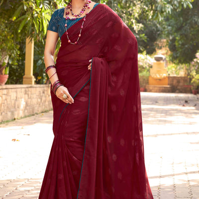 Maroon Woven Georgette Saree With Tassels