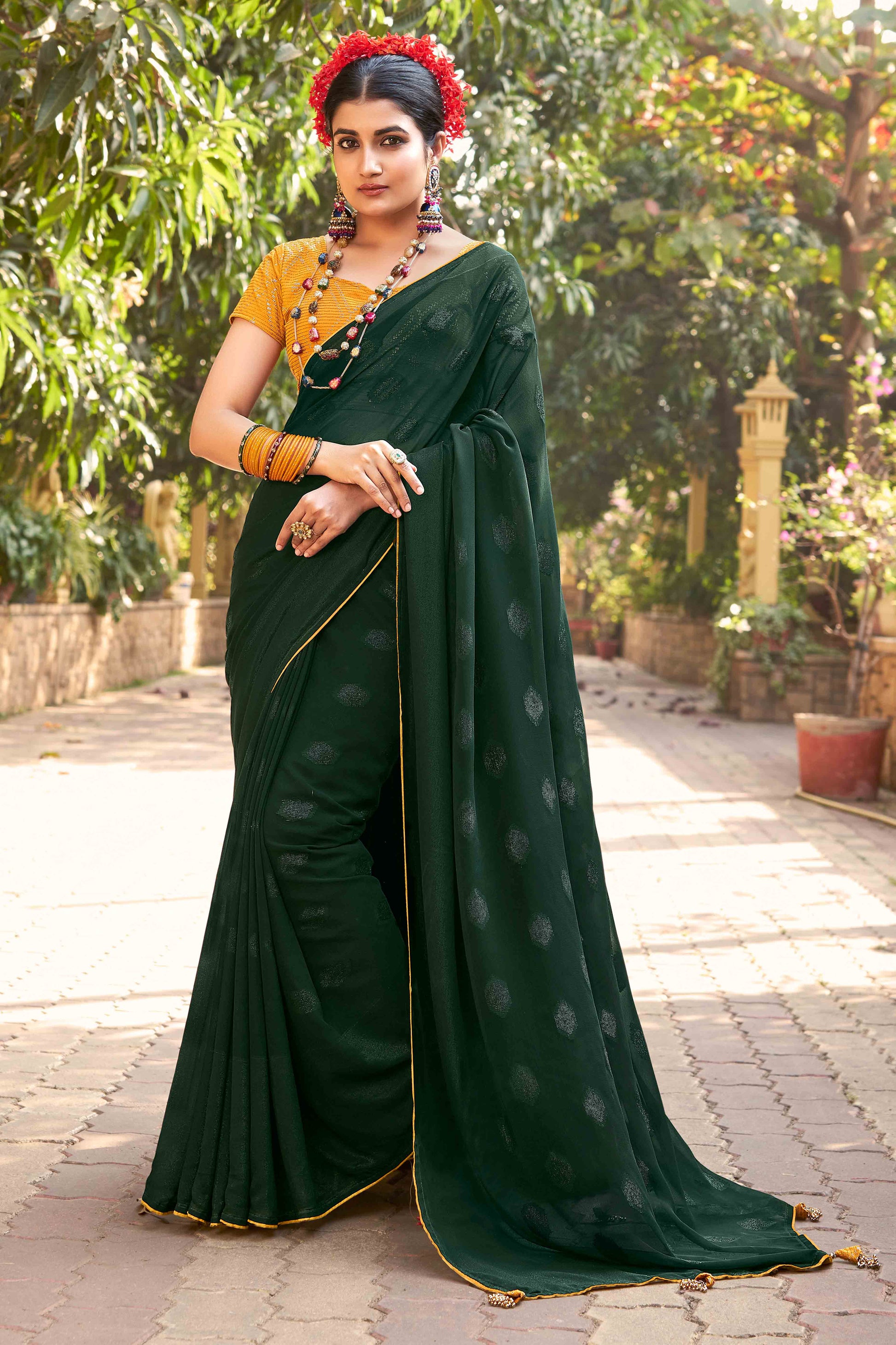 green-woven-georgette-saree-with-tassels-6