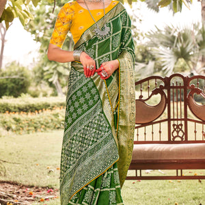 green-bandhani-printed-dola-silk-saree-with-jacquard-border