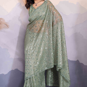 green-sequins-embroidered-twill-net-saree