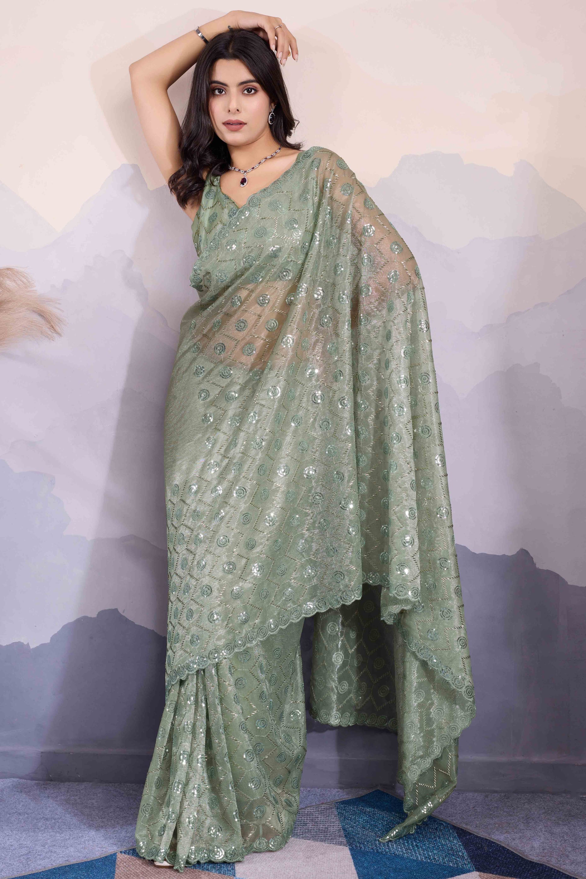green-sequins-embroidered-twill-net-saree