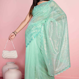 Foam Sea Green Sequins Embroidered Silver Twill Net Saree