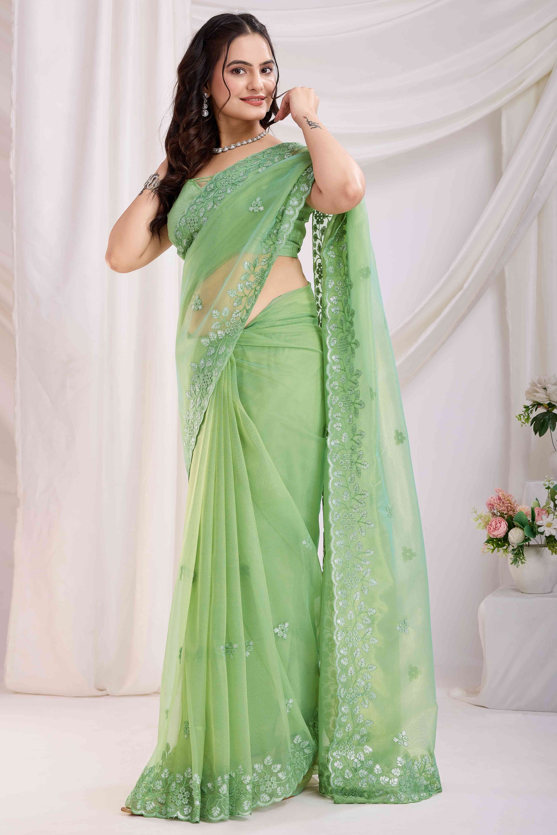 green-floral-sequins-embroidered-twill-net-saree-8