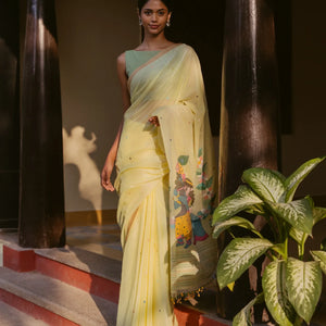 Yellow Handloom Bengal Cotton Saree With Radha Krishna In a Floral Swing Pallu design
