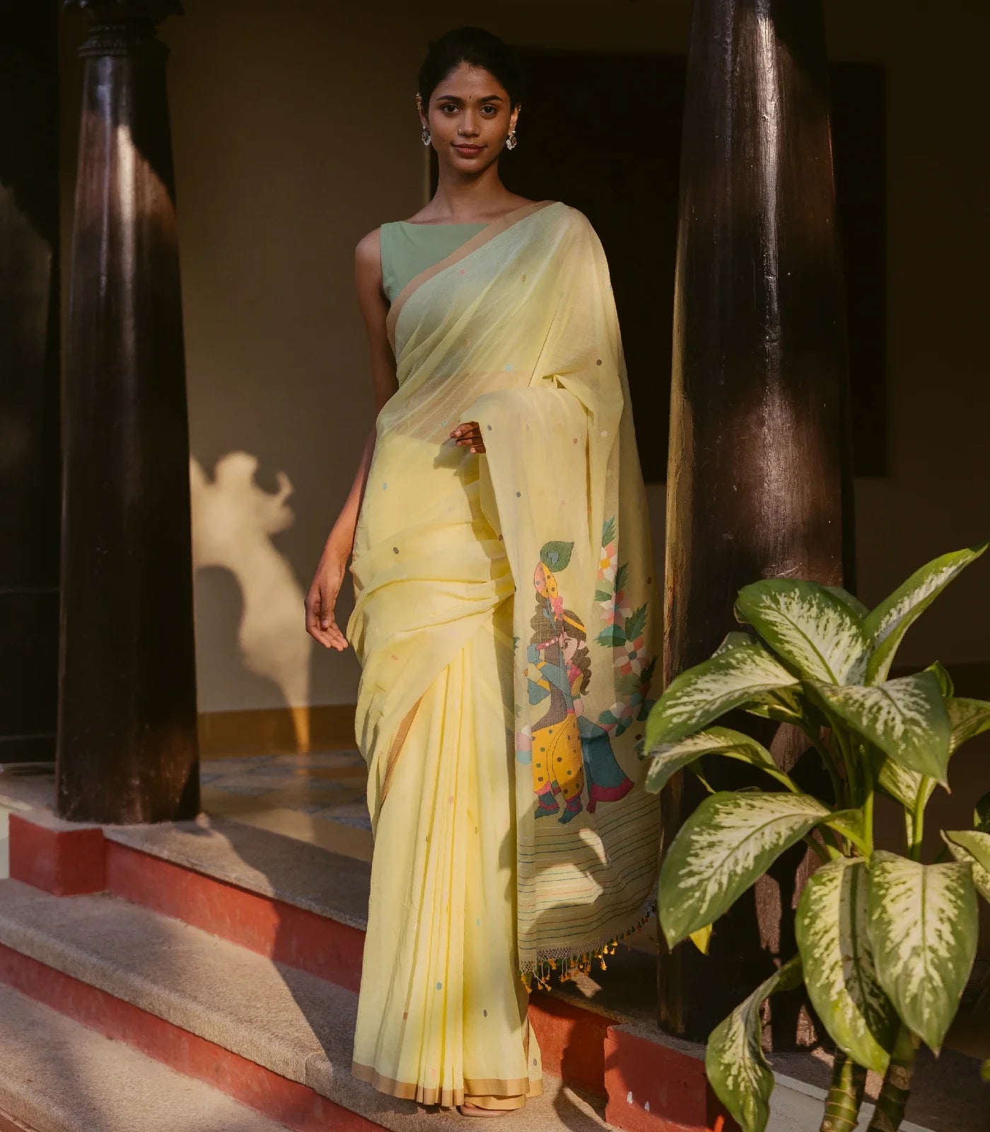 Yellow Handloom Bengal Cotton Saree With Radha Krishna In a Floral Swing Pallu design