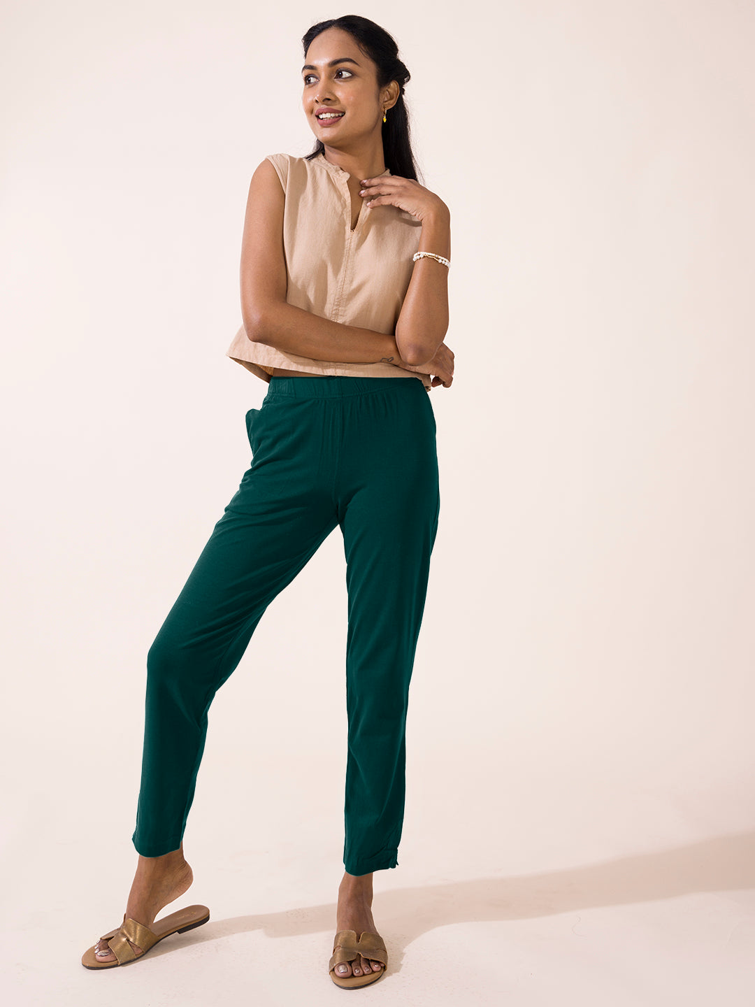 Women Solid Dark Green Cotton Mid Rise Kurti Pants