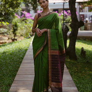 Green Handloom Kadapa cotton saree adorned with red Meenakari buttis