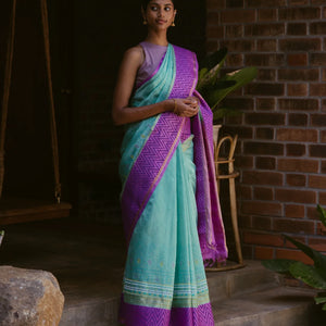 Turquoise Handloom Chirala Silk Cotton Saree With Handknotted traditional motifs above the border