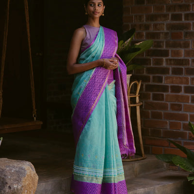 Turquoise Handloom Chirala Silk Cotton Saree With Handknotted traditional motifs above the border
