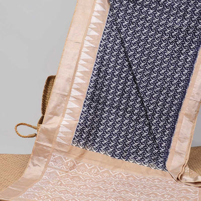 Blue intricate design ikkat saree with triangle motifs & geometric, floral motifs pallu