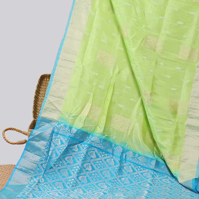 Green floral buttas uppada saree with contrast zari border & floral buttas enclosed with argyle design pallu