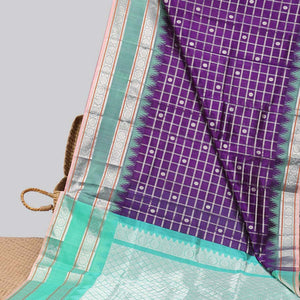 Purple floral motifs enclosed with checked kuppadam cotton saree with contrast zari border & pallu of argyle pattern