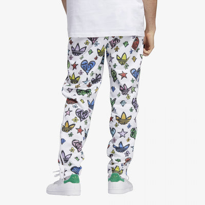 Adidas Originals | JEREMY SCOTT MONOGRAM FIREBIRD TRACK PANTS (GENDER NEUTRAL)