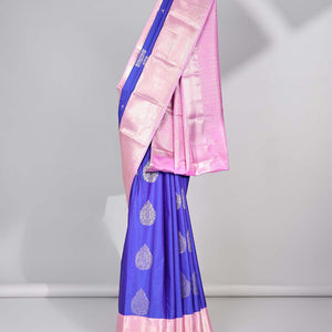 Blue floral motifs gift saree with contrast paisley border & intricate zari design pallu