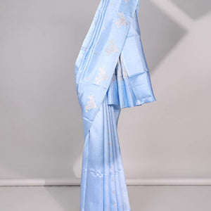 Blue floral buttas raw mango silk saree with self floral border & jaal zari design pallu