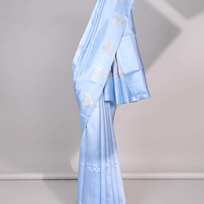 Blue floral buttas raw mango silk saree with self floral border & jaal zari design pallu