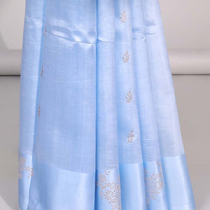 Blue floral buttas raw mango silk saree with self floral border & jaal zari design pallu