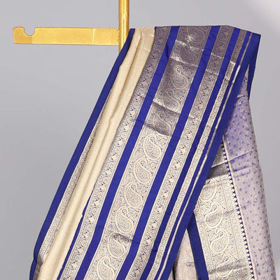 Cream Semi banaras tissue saree with contrast traditional zari border & pallu of intricate design