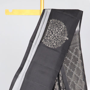 Grey checked Mayur soft silk saree with contrast leaf motifs border & argyle pattern pallu