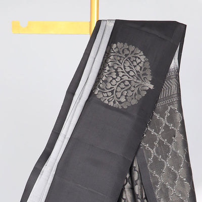 Grey checked Mayur soft silk saree with contrast leaf motifs border & argyle pattern pallu